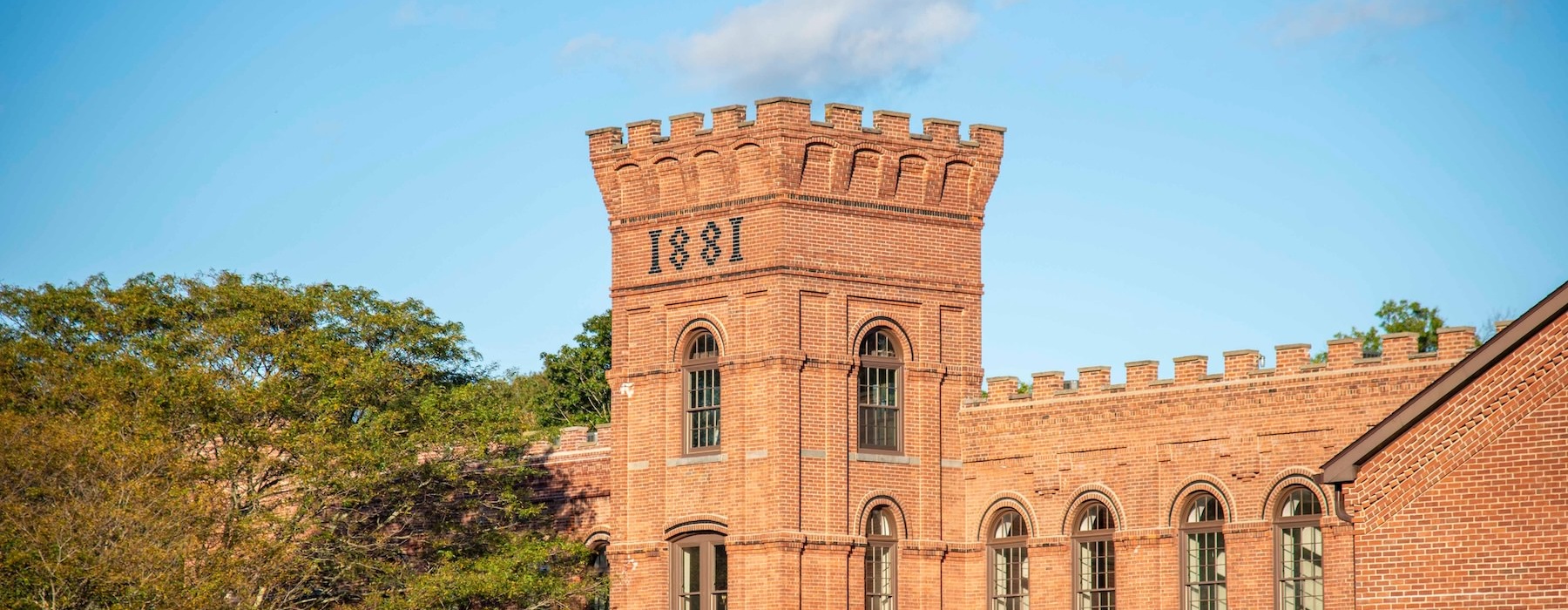 a brick building with a tower